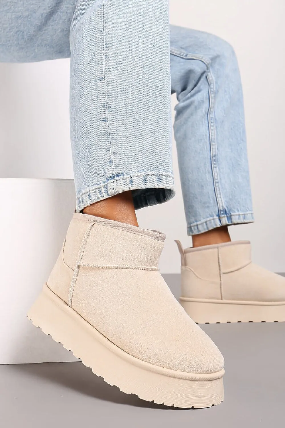 CREAM ULTRA MINI PLATFORM FAUX FUR LINED ANKLE BOOTS